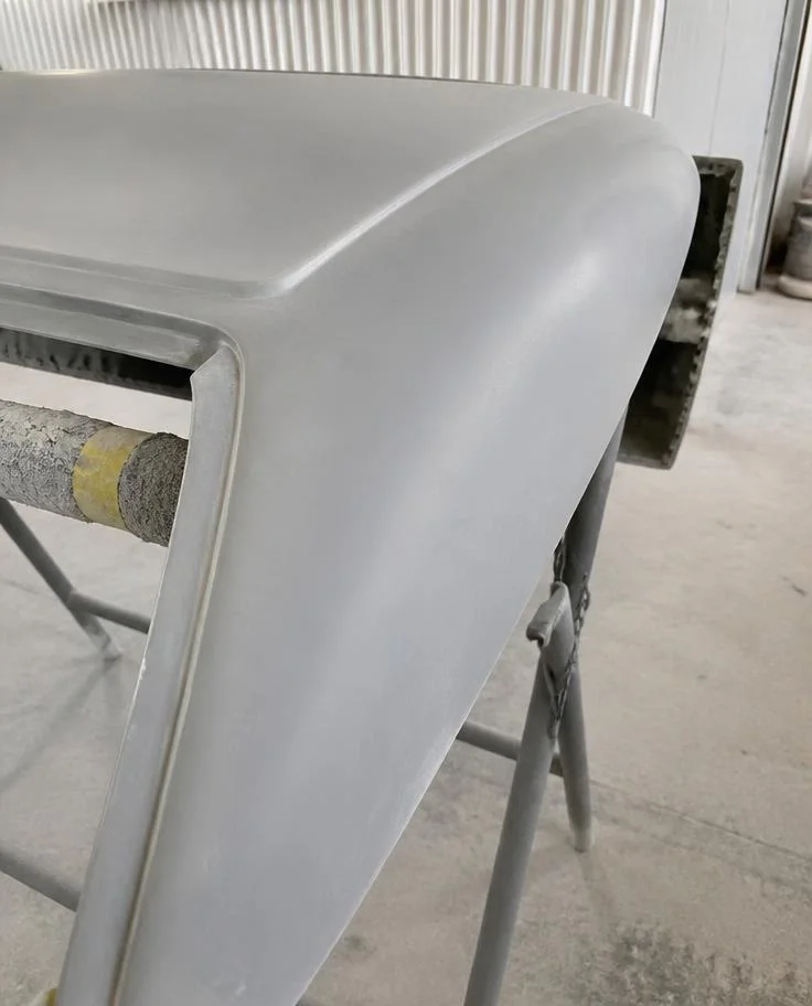 Sanded and shaped fibreglass panel section ready for priming — TKM Smash Repairs, Edmonton QLD