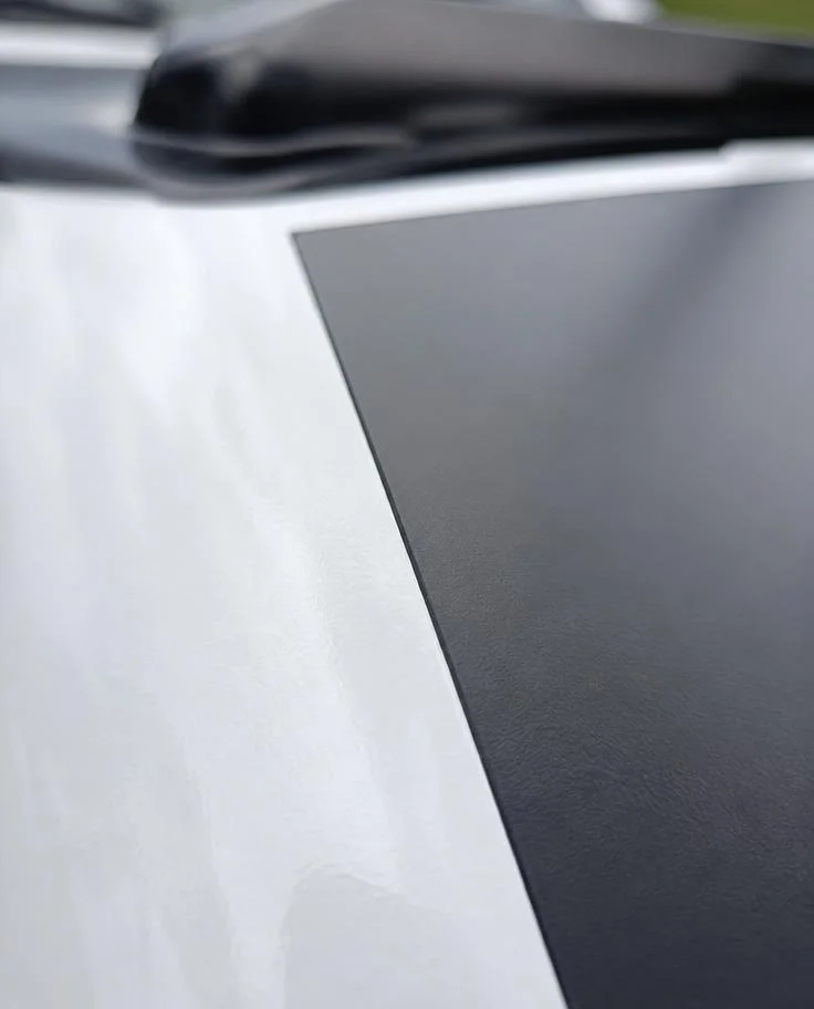 Close-up of a crisp vinyl decal edge on a vehicle panel — TKM Smash Repairs, Edmonton QLD